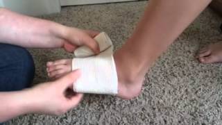 Applying a Figure 8 Elastic Bandage to an Ankle [upl. by Draneb824]