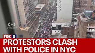 Protestors clash with police in Times Square [upl. by Ayt660]