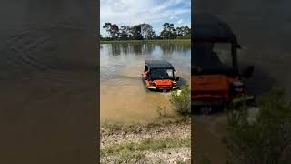 TINGER Amphibious ATV climbing out of dam [upl. by Enitnatsnoc]