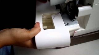 OVERLOCK SINGER 14SH764 QUITAR COMPARTIMENTO [upl. by Nimajnab181]