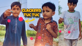 Clackers TUC TUC Game  how to play clackers tak tak  Clackers toy ball  1970s Clackers [upl. by Nashbar]