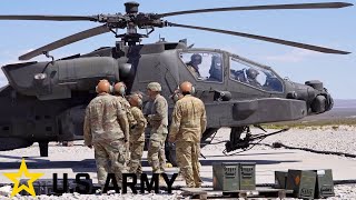 US Army Powerful AH64E Apache attack helicopters Loading and live firing [upl. by Berfield497]