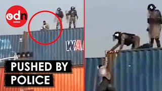 Horrifying Moment Man Praying is Pushed off Container in Pakistan [upl. by Sheryl]