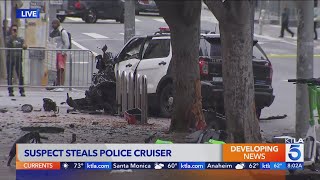 Man steals LAPD patrol vehicle with officer still inside [upl. by Cilurzo]