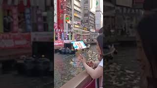 JAPANESE ELECTRONIC FLOATING BILLBOARD in the DOTONBORI RIVER of OSAKA JAPAN [upl. by Cacia696]