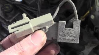 How to Replace Ignition Coil Part 96BB 18801 AA on Ford Contour [upl. by Morty]