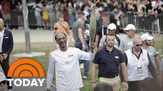 Watch Snoop Dogg carry the Olympic torch into Paris [upl. by Irama]