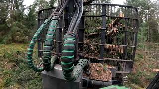 John Deere 1010G Loading spruce branches for road repair [upl. by Mercier]