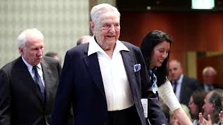 George Soros hands control of empire to son WSJ [upl. by Yattirb]