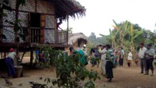 Rice Pounding  a Naga Village on Chindwin river Nagaland Myanmar [upl. by Akimik58]