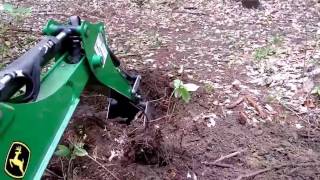 Removing an OLD Stump with the John Deere 1023e Backhoe [upl. by Sandra]