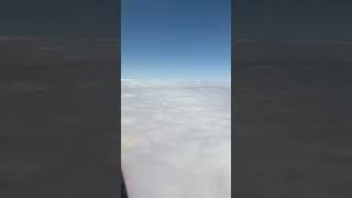 Flying above the clouds travel nature viewfrommywindow airplane beautifuldestinations [upl. by Lerret]