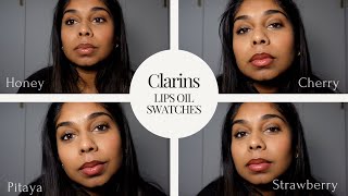 Clarins Lip Comfort Oil Swatches on Tan Skin  Honey Cherry Pitaya and Strawberry [upl. by Marielle]