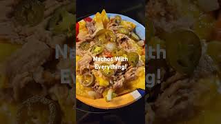 Nachos Add cheese jalapenos onions and more [upl. by Aseiram416]