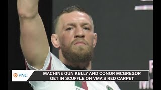 Conor McGregor Machine Gun Kelly Have Heated Exchange At VMAs [upl. by Suiremed35]