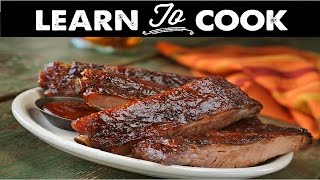 How to Cook Barbecue Ribs on The Grill [upl. by Heyes]