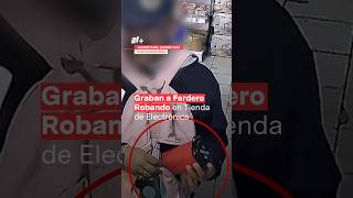 Cámaras de seguridad graban a fardero robando en tienda de electrónica  N Shorts [upl. by Rettuc]