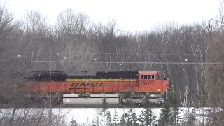 BNSF SD70ACe Leads UMADALL on a snowy afternoon [upl. by Lynnet]