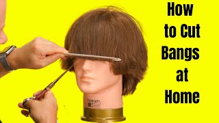 How to Cut Bangs at Home  TheSalonGuy [upl. by Anama]