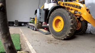 Trailering and hauling construction equipment [upl. by Thun]