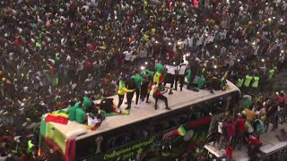 Sénégal les vainqueurs de la CAN accueillis en héros dans les rues de Dakar [upl. by Ahsyia]