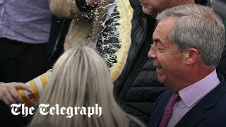 Milkshake thrown over Nigel Farage as he launches campaign in Clacton [upl. by Ydderf]