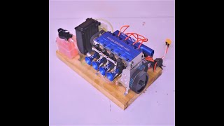 MINI REAL 14cc Inline 4 Cylinder Fourstroke Watercooled Engine  TOYAN FSL400 [upl. by Eneleahcim]