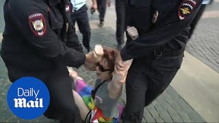 Russian police arrest 30 gay rights activists in St Petersburg [upl. by Celestia]