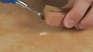 How to repair a hole or chip in a tile [upl. by Cuttie]