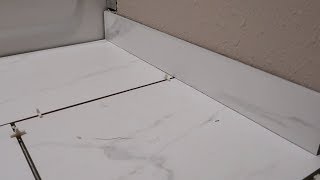 How To Install A Tile Bullnose Baseboard SIMPLE amp EASY [upl. by Erin790]