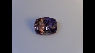 Faceting gemstones cutting an ametrine cushion shape [upl. by Odrude]