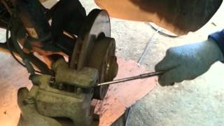 DIY  How to replace front brake pads and wear sensor BMW E46 E39 [upl. by Sikko]