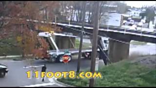 Semi gets bent out of shape at the 11foot8 bridge [upl. by Corder]