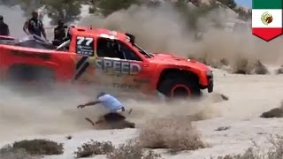 Spectator survives getting smashed and run over in Baja 500 [upl. by Ardnuaek]