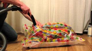 packing an eiderdown quilt into vacuum bag using vacuum cleaner HD [upl. by Lipman]