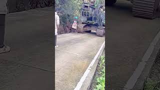 The process of rock crusher crossing cement road [upl. by Maitund]