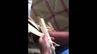 Weaving handle on a Lauhala basket [upl. by Lakin637]