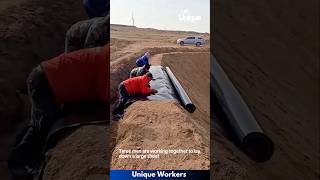 Plastic sheeting being laid down desert  The workers do their job perfectly  machine shorts [upl. by Auqenahc420]