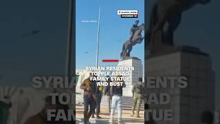 Syrian residents topple Assad family statue and bust [upl. by Laefar]