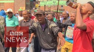 South Africa Xenophobia Foreigners are taking our jobs  BBC News [upl. by Ymerej]