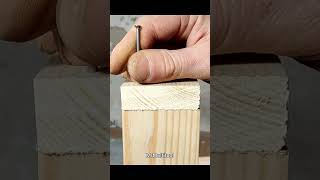 Hammering nails into a board [upl. by Nilyam]