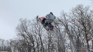 Larry Enticer Jumps Over Bus On Snowmobile [upl. by Notlad]