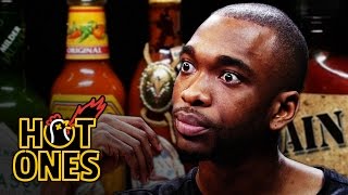 Jay Pharoah Has a Staring Contest While Eating Spicy Wings  Hot Ones [upl. by Thain]