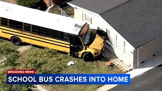 School bus crashes into house in Skokie 3 injured police say [upl. by Tillford]