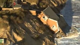 Aerial view homes fall into sea in Hemsby Norfolk after tidal surge [upl. by Nerro450]