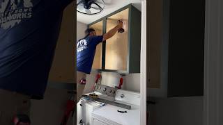 Installing an upper cabinet DIY Cabinet howto EZCabinets woodworking [upl. by Ihskaneem]