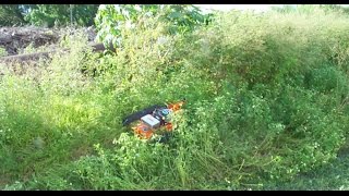 Slope Mower VS 4 Foot Grass On 45 Degree Slope [upl. by Ahsieyk626]