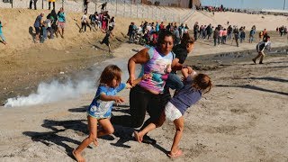 Hundreds of migrants try to storm US border [upl. by Eniamrahs]