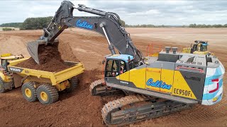 Volvo EC950F Excavator Loading A60H ADTs [upl. by Ferino984]