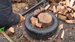 Hout kloven met autoband splitting wood with a tire [upl. by Buchbinder]